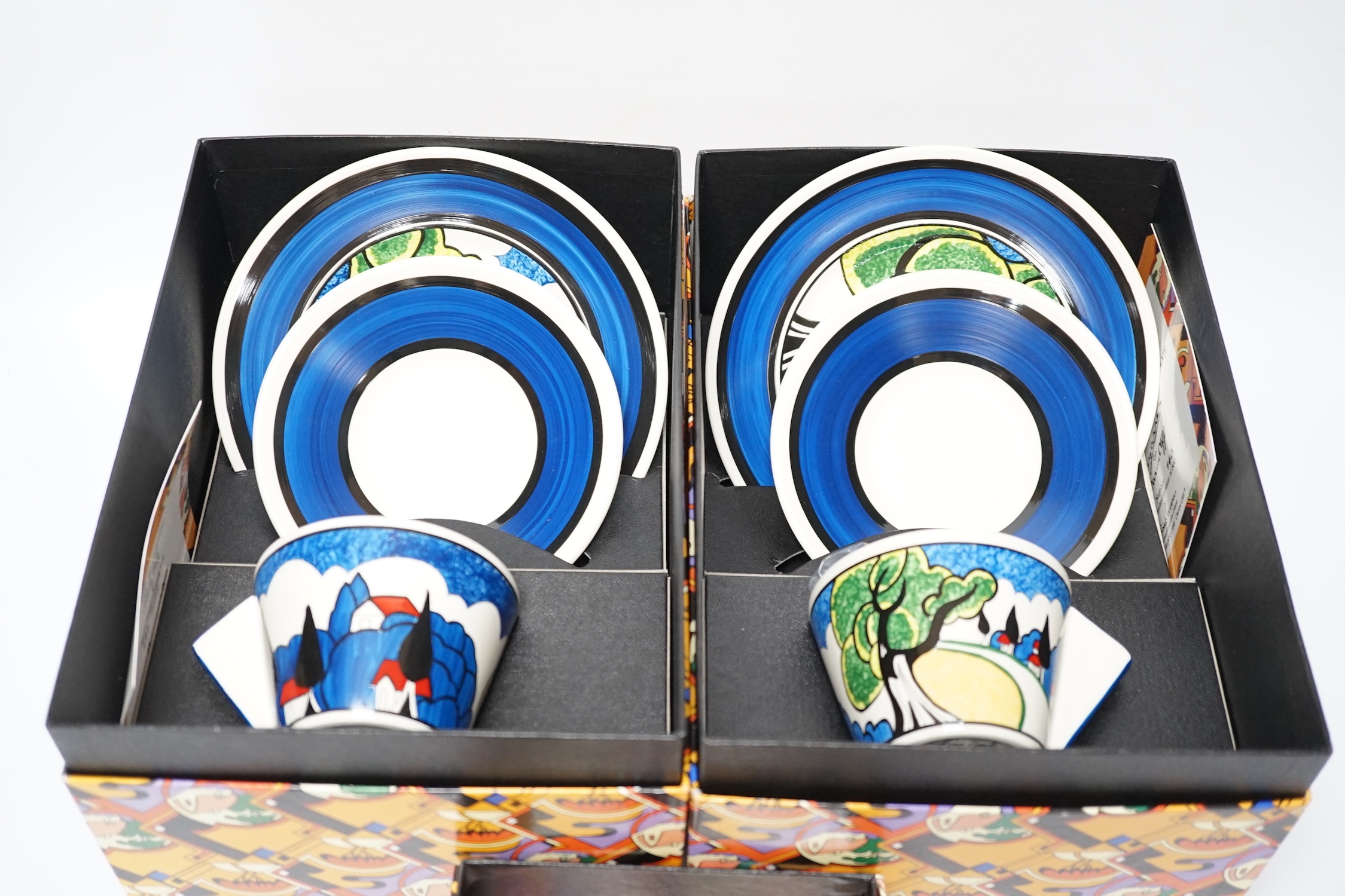 Two Wedgwood Clarice Cliff limited edition May Avenue trios together with a carpet conical sugar, each with boxes and certificates